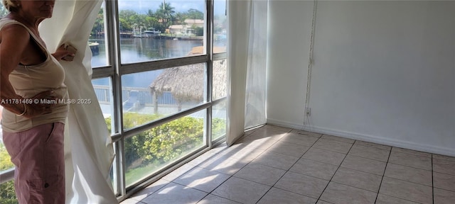2001 Atlantic Shores Blvd Unit 220, Hallandale Beach, FL 33009 - room details featuring a water view and baseboards
