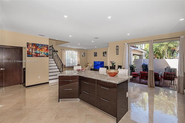 1094 Redwood St ., Unit Hollywood, FL 33019 - kitchen with open floor plan, marble finish floor, modern cabinets, and dark brown cabinetry