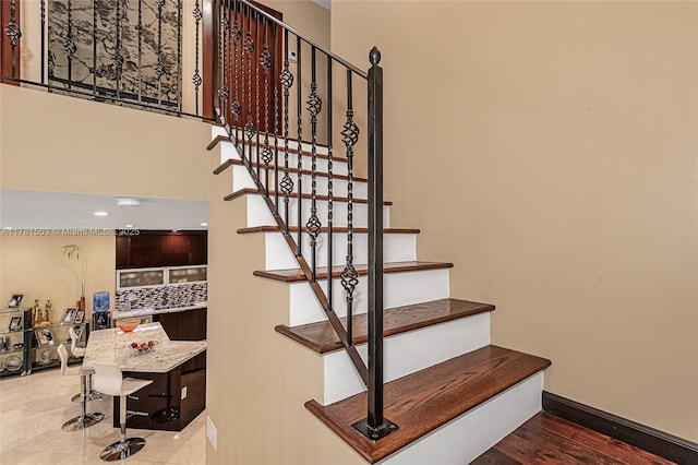 1094 Redwood St ., Unit Hollywood, FL 33019 - staircase featuring baseboards