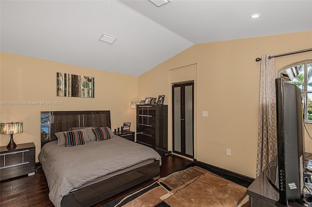 1094 Redwood St ., Unit Hollywood, FL 33019 - bedroom with visible vents, baseboards, recessed lighting, wood finished floors, and vaulted ceiling
