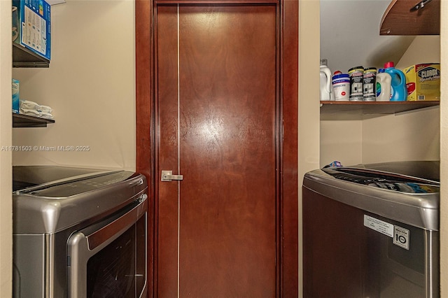 1094 Redwood St ., Unit Hollywood, FL 33019 - washroom featuring washer and dryer and laundry area