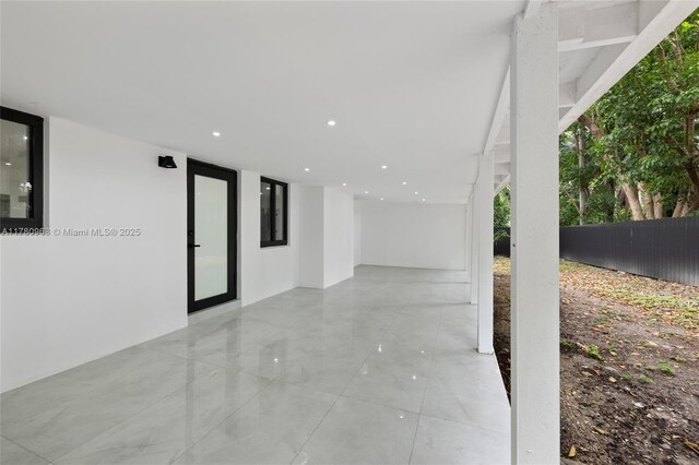 view of patio featuring fence