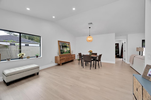 dining space featuring light wood-style floors, baseboards, visible vents, and recessed lighting