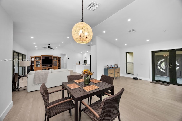 dining area with visible vents, ceiling fan with notable chandelier, recessed lighting, and light wood finished floors