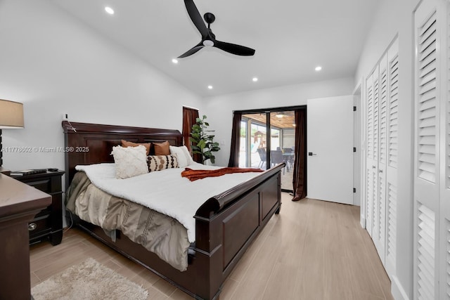 bedroom with recessed lighting, light wood-style floors, and lofted ceiling