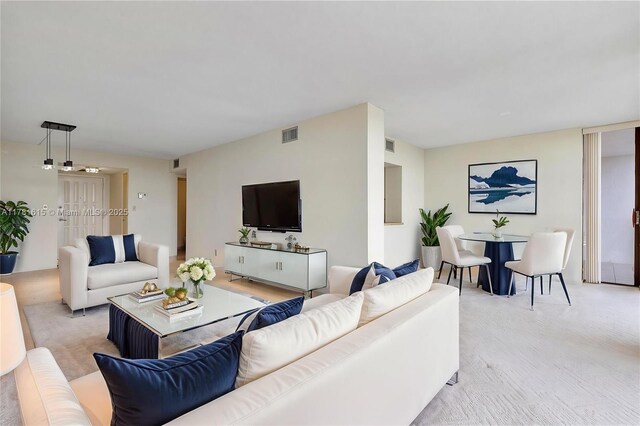 600 Parkview Dr Unit 625, Hallandale Beach, FL 33009 - living area featuring visible vents and light colored carpet