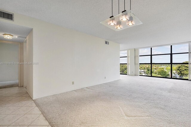 600 Parkview Dr Unit 625, Hallandale Beach, FL 33009 - bedroom featuring access to outside, visible vents, and expansive windows