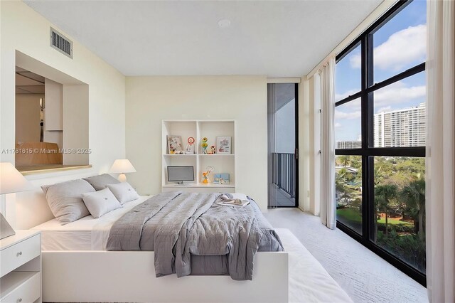 600 Parkview Dr Unit 625, Hallandale Beach, FL 33009 - carpeted empty room featuring a textured ceiling, floor to ceiling windows, and plenty of natural light