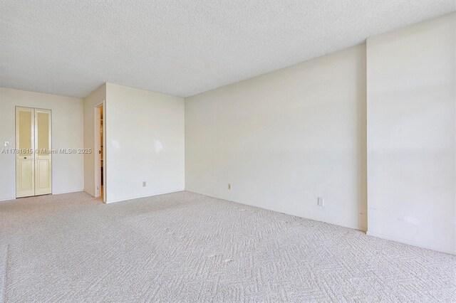 600 Parkview Dr Unit 625, Hallandale Beach, FL 33009 - carpeted spare room with a textured ceiling