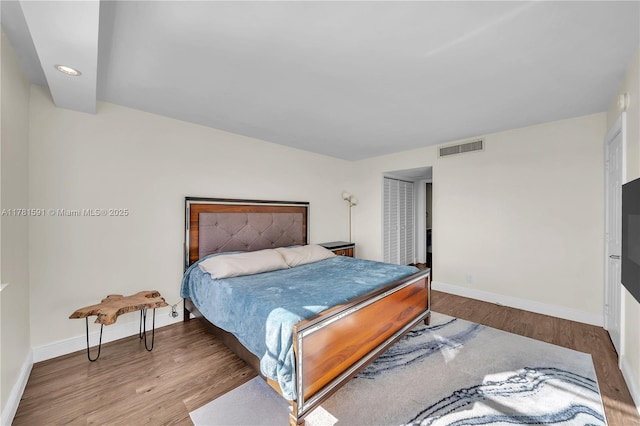 6770 Indian Creek Dr Unit 9G, Miami Beach, FL 33141 - bedroom with wood finished floors and recessed lighting