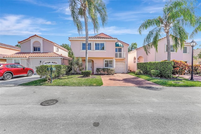 1163 SE 6th Ct, Dania Beach, FL 33004 - view of front facade featuring an attached garage, driveway, and stucco siding