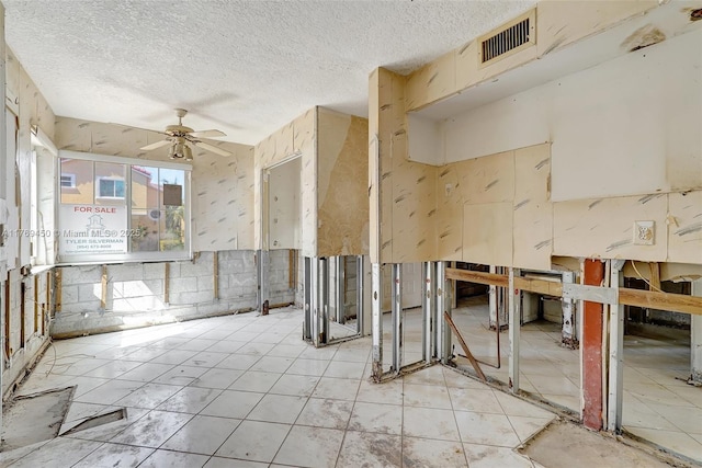 1163 SE 6th Ct, Dania Beach, FL 33004 - empty room with ceiling fan and a textured ceiling