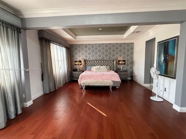 bedroom featuring dark wood-type flooring, baseboards, and ornamental molding