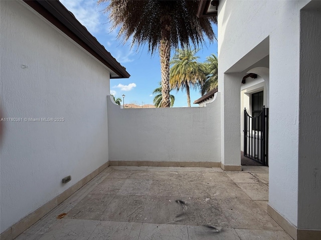view of patio with fence