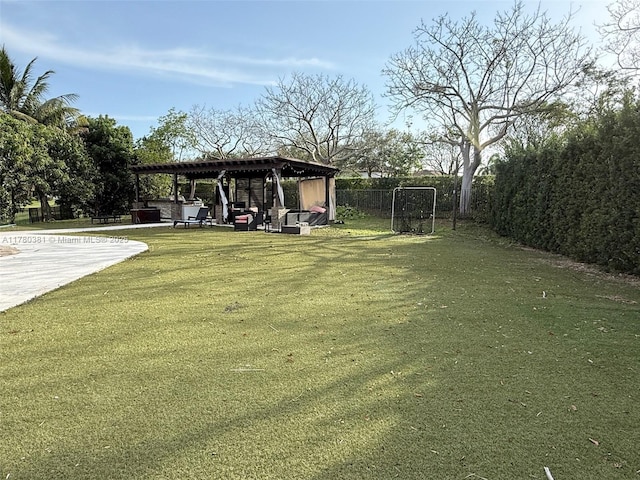 view of yard featuring a patio and fence