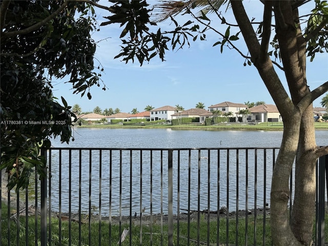 view of water feature with a residential view