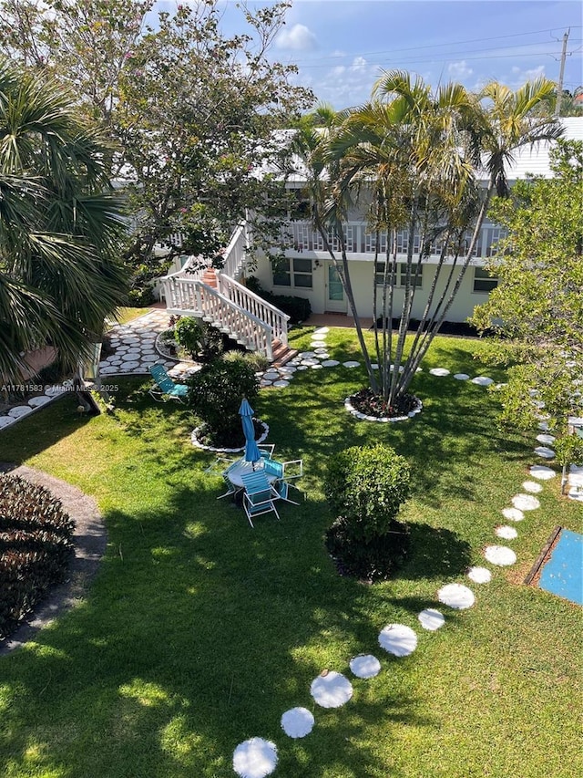 view of yard with stairway