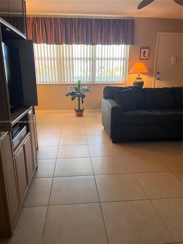living area featuring light tile patterned floors