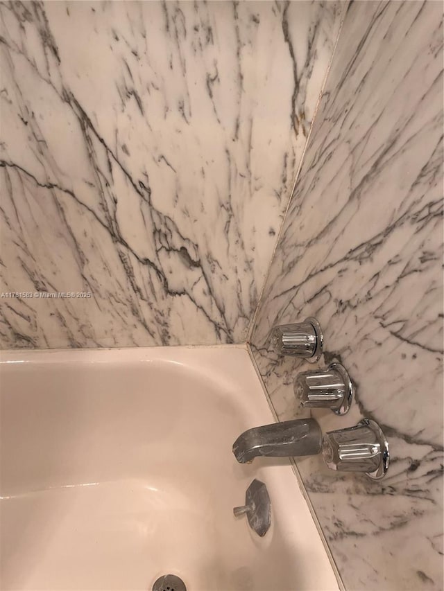 interior details with a bathtub