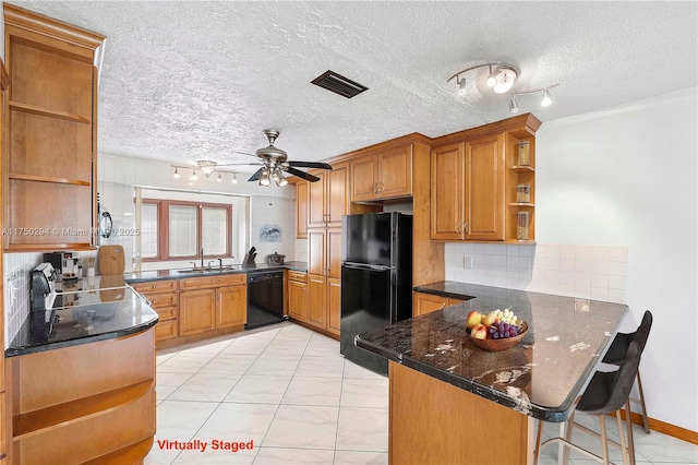 5300 Adams St, Hollywood, FL 33021 - kitchen with open shelves, black appliances, a sink, a peninsula, and a ceiling fan