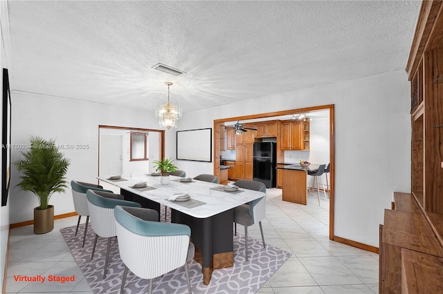 5300 Adams St, Hollywood, FL 33021 - dining area featuring a chandelier, baseboards, and a ceiling fan