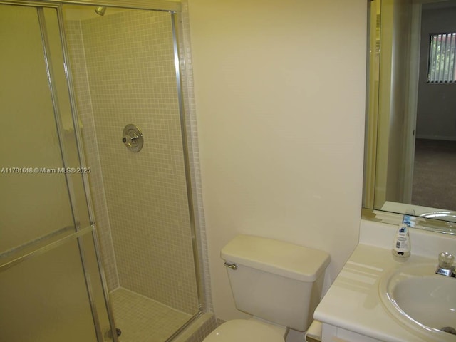9674 S Belfort Cir Unit 202, Tamarac, FL 33321 - bathroom with toilet, a stall shower, and vanity