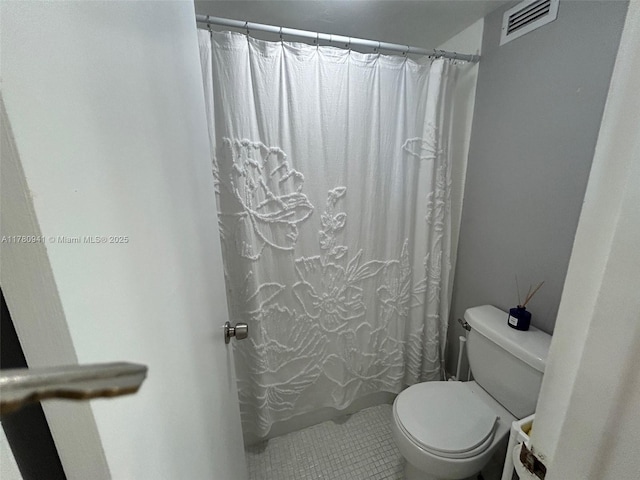 2899 Collins Ave Unit 708, Miami Beach, FL 33140 - bathroom with tile patterned floors and curtained shower