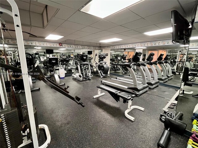 2899 Collins Ave Unit 708, Miami Beach, FL 33140 - exercise room featuring a drop ceiling