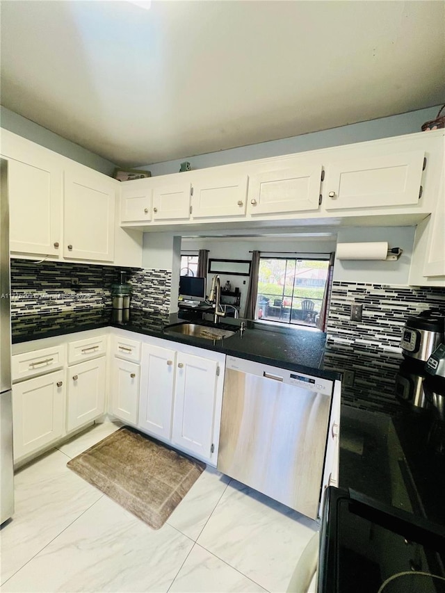 225 Lakeside Cir, Sunrise, FL 33326 - kitchen with stainless steel dishwasher, white cabinets, and backsplash