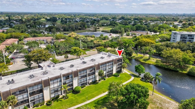 birds eye view of property featuring a water view