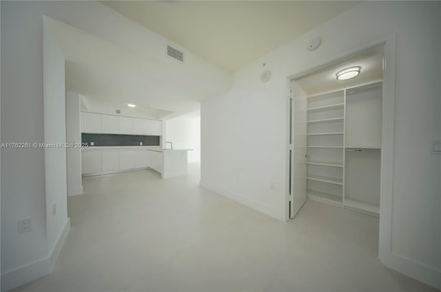 300 Sunny Isles Blvd Unit 4-1904, Sunny Isles Beach, FL 33160 - hallway with baseboards and concrete floors
