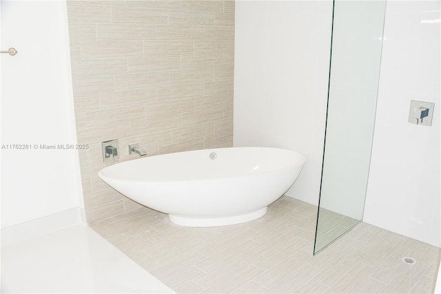 300 Sunny Isles Blvd Unit 4-1904, Sunny Isles Beach, FL 33160 - full bathroom with a soaking tub