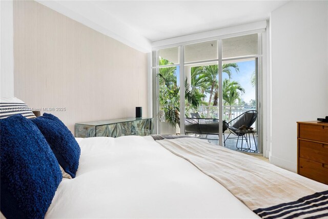 1 Century Ln Unit 309, Miami Beach, FL 33139 - bedroom featuring access to outside and floor to ceiling windows