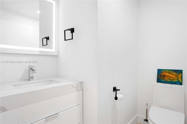 1 Century Ln Unit 309, Miami Beach, FL 33139 - bathroom featuring toilet and vanity