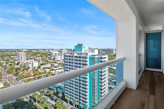 balcony featuring a city view