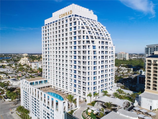 view of building exterior featuring a view of city