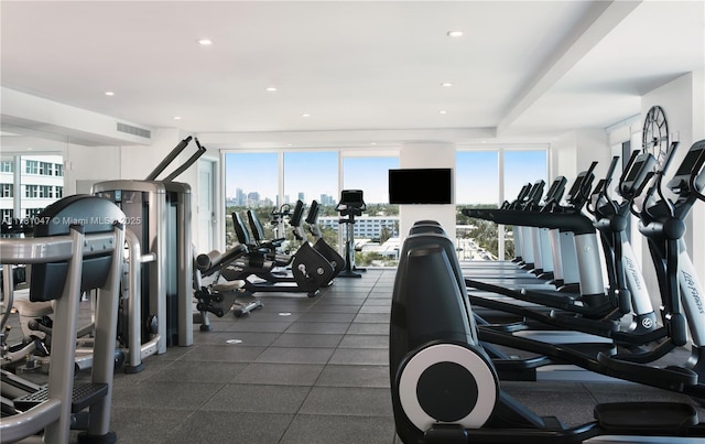workout area with visible vents and recessed lighting