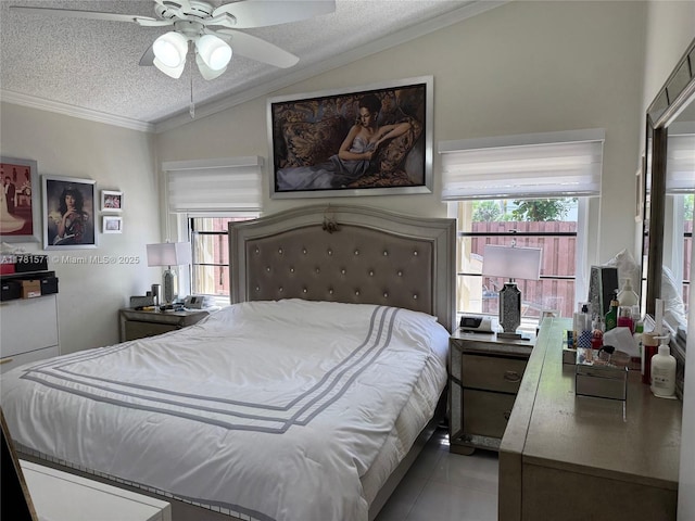 17012 NW 66th Ct, Hialeah, FL 33015 - bedroom featuring a textured ceiling, vaulted ceiling, tile patterned flooring, ceiling fan, and ornamental molding