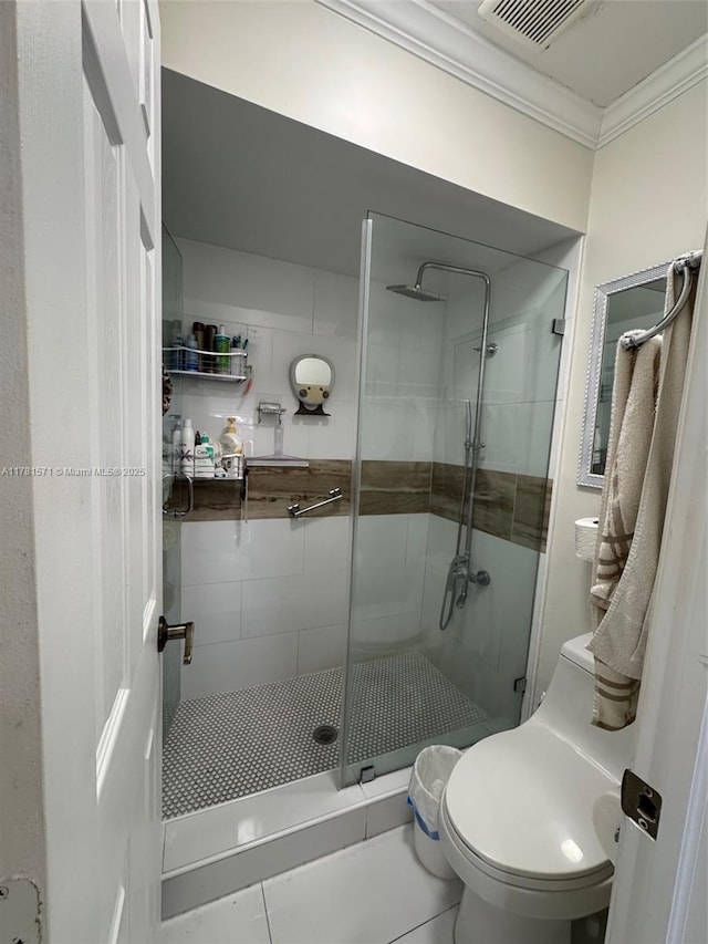 17012 NW 66th Ct, Hialeah, FL 33015 - bathroom with crown molding, visible vents, toilet, and a shower stall