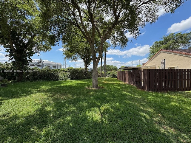 17012 NW 66th Ct, Hialeah, FL 33015 - view of yard featuring fence