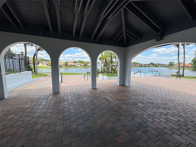 17012 NW 66th Ct, Hialeah, FL 33015 - view of patio / terrace featuring an outdoor pool and a water view