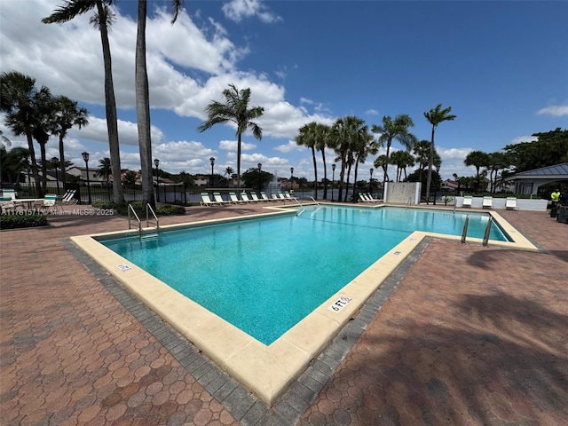 17012 NW 66th Ct, Hialeah, FL 33015 - community pool featuring fence and a patio area