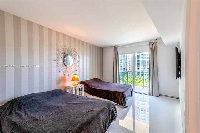 250 Sunny Isles Blvd Unit 3-805, Sunny Isles Beach, FL 33160 - tiled bedroom with wallpapered walls