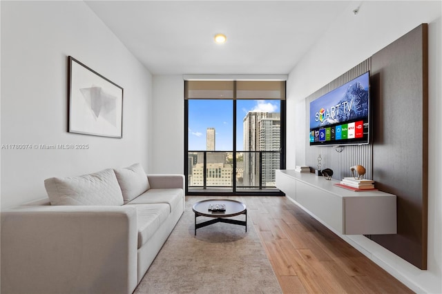 398 NE 5th St Unit 2119, Miami, FL 33132 - living area featuring wood finished floors and expansive windows