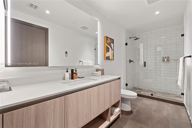 398 NE 5th St Unit 2119, Miami, FL 33132 - bathroom with vanity, visible vents, a stall shower, and toilet