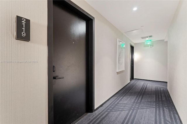 398 NE 5th St Unit 2119, Miami, FL 33132 - hallway with dark carpet and visible vents