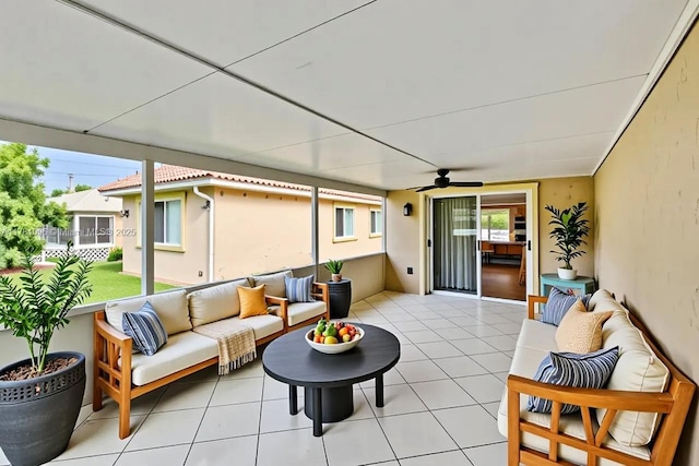 exterior space with an outdoor living space and ceiling fan