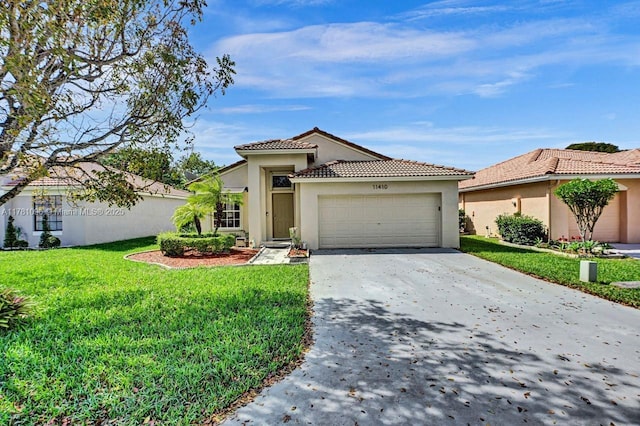 view of front of house featuring driveway, a tile roof, a front lawn, an attached garage, and stucco siding