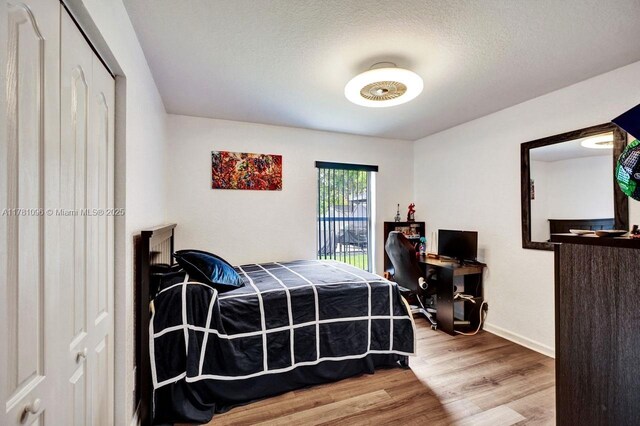 11410 SW 20th St, Miramar, FL 33025 - bedroom featuring wood finished floors and baseboards