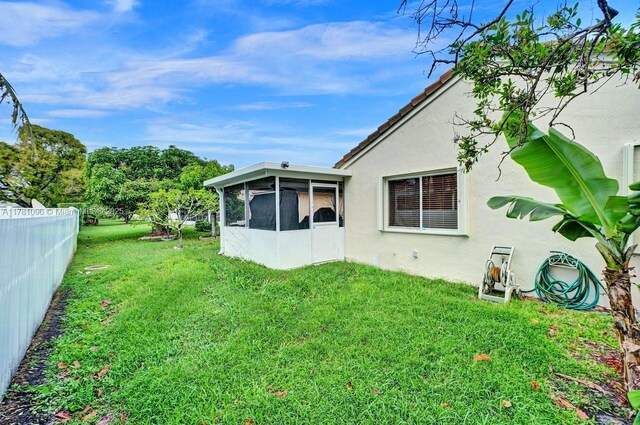 11410 SW 20th St, Miramar, FL 33025 - view of yard featuring a sunroom